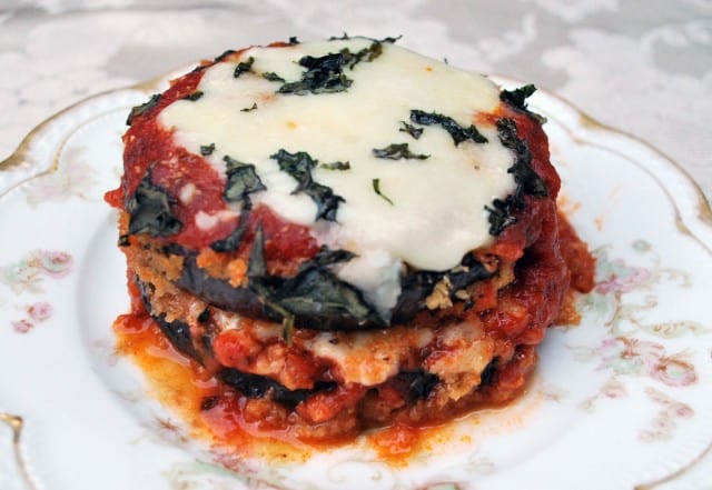 Baked Eggplant Parmesan on a pretty china plate - an original image from first publication of recipe.