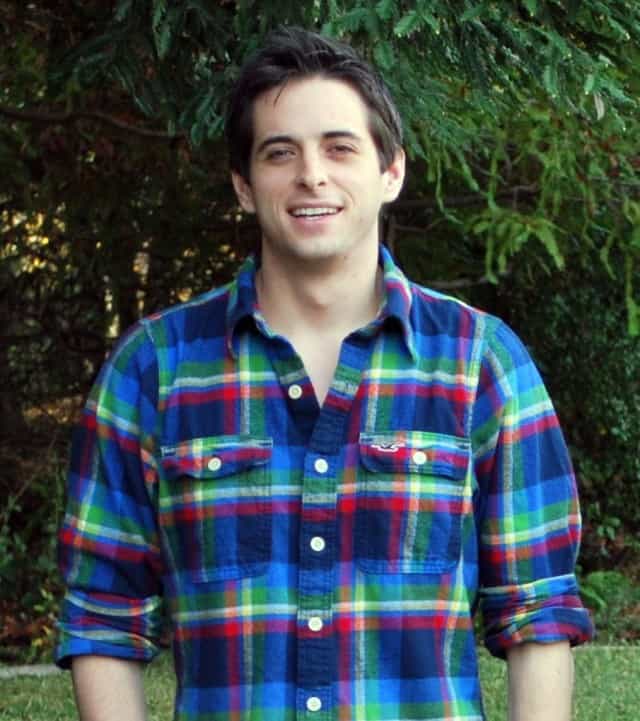 A picture of Valerie's son, Ryan - a handsome young man with brown hair and a plaid shirt.