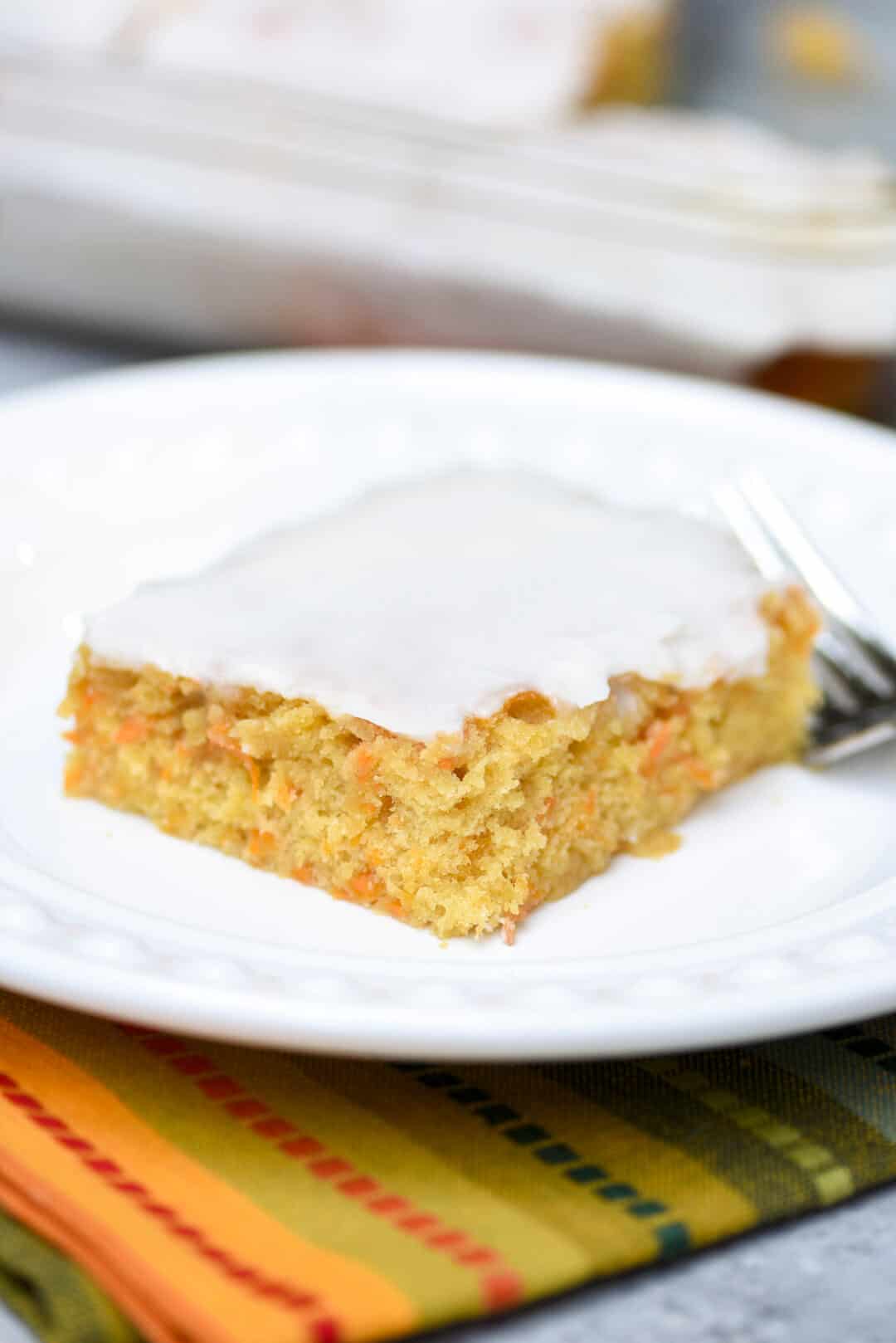 This Golden Yam Cake has an extremely moist and delicate texture and is topped with a simple powdered sugar icing that complements it perfectly. 