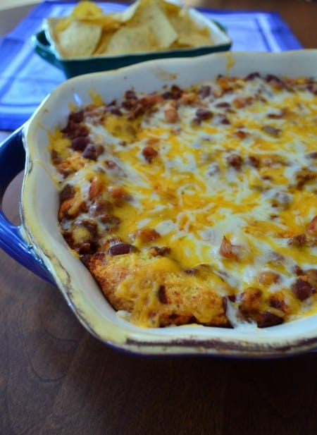 A serving dish full of Turkey Chili Cornbread Bake.