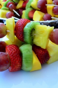 A stack of fruit kabobs.