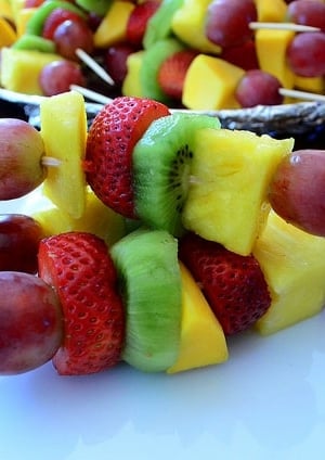 A stack of fruit kabobs.