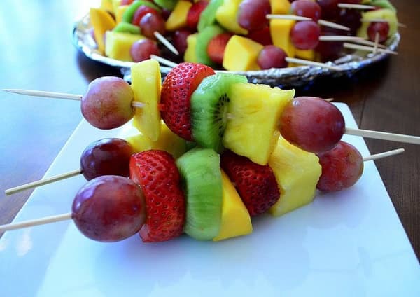 A stack of fruit kabobs.