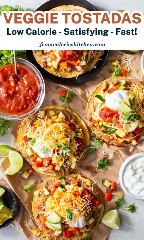 An over the top shot of veggie tostadas on parchment paper with overlay text.