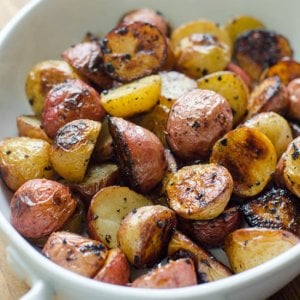 A bowl of roasted potatoes.