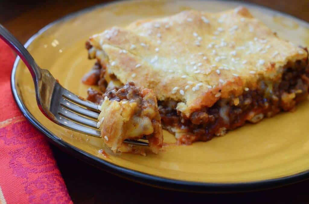 A fork breaks into a slice of Sloppy Joe Squares.