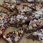 Pumpkin Spice Chocolate Bark on a wood board.