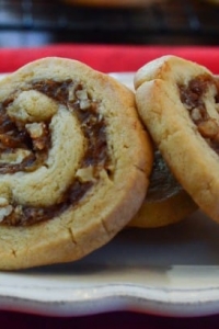 A close up of date pinwheels cookies on a plate.
