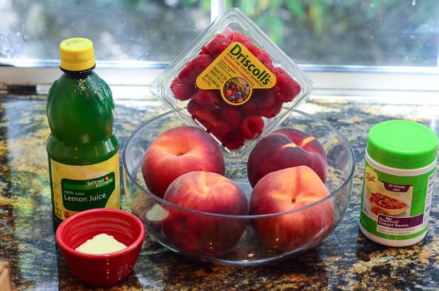 All the ingredients required to make Peach Raspberry Freezer Jam.