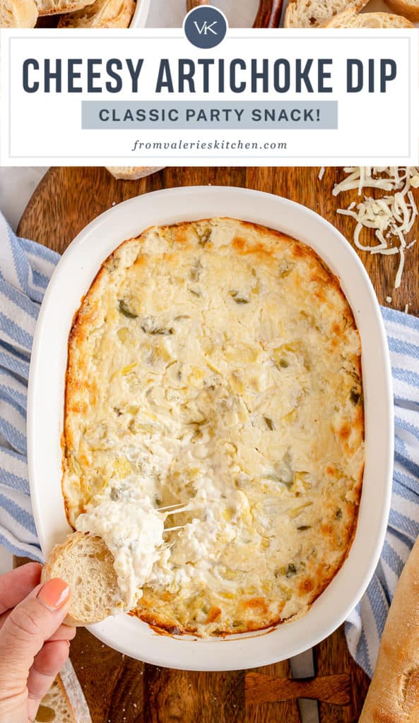 A hand dips a baguette slice into Artichoke Dip with text overlay.