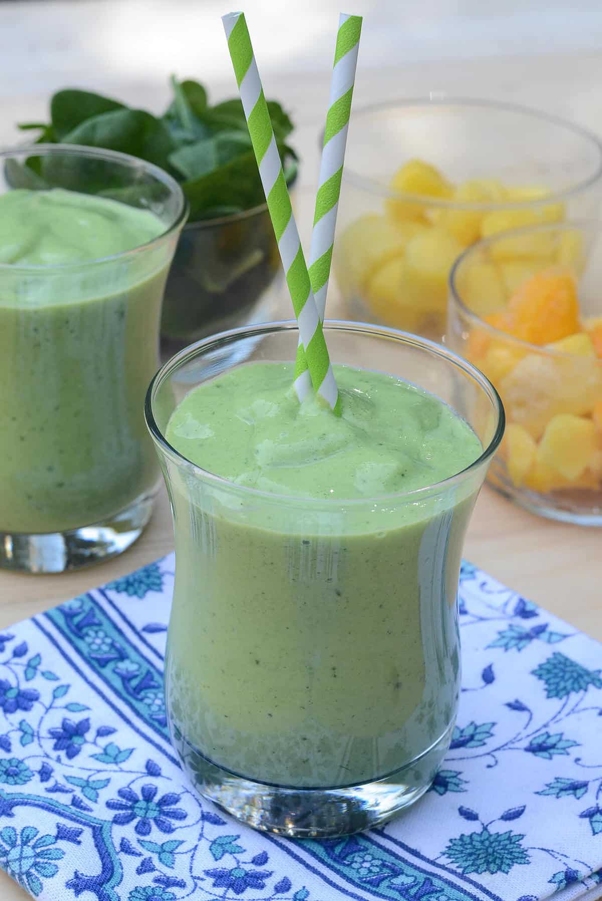 Packed with nutrition and incredible flavor, this creamy Tropical Green Smoothie is a delicious way to start the day!