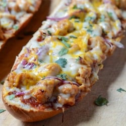 A close up of french bread pizza.