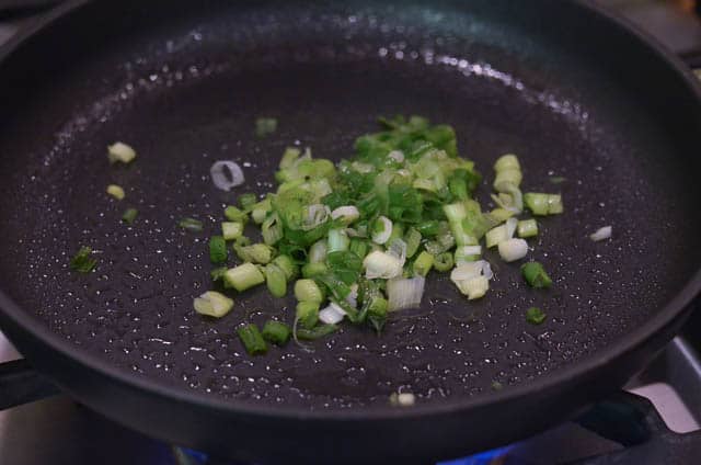 Green onions in a skillet