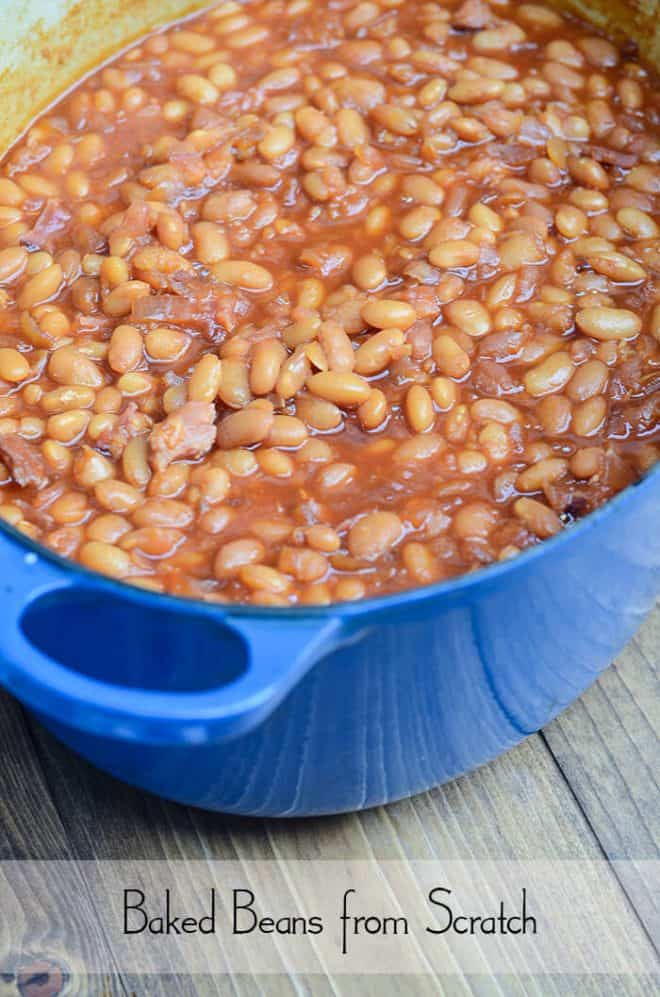 A blue Dutch oven filled with Baked Beans from Scratch.