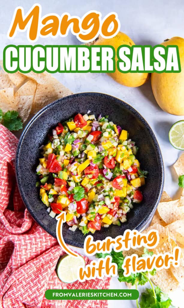 A bowl of mango cucumber salsa next to an orange and white kitchen cloth and tortilla chips with text overlay.