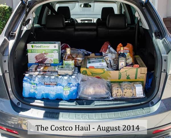The back of a car filled with items from Costco.