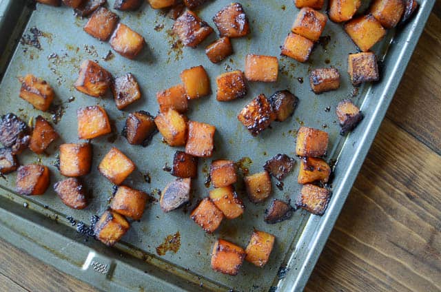 The roasted squash on a baking sheet.