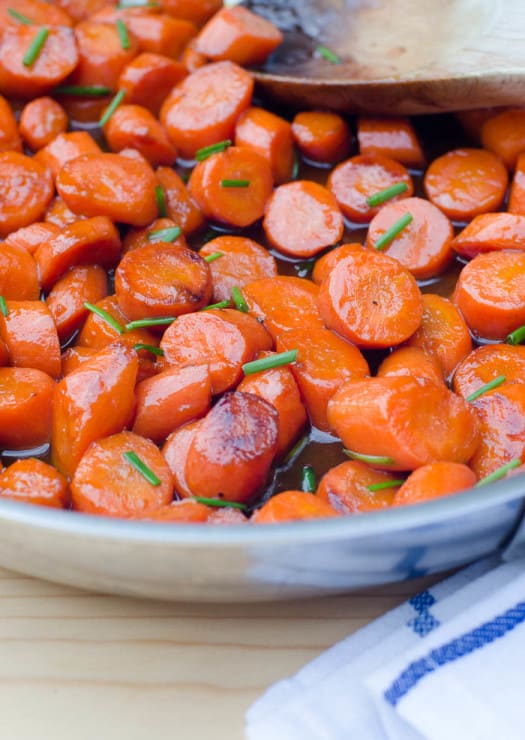 A closeup of glazed carrots.