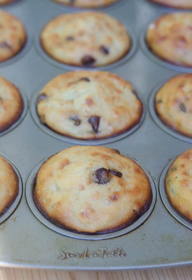 The muffins in a muffin pan after coming out of the oven.