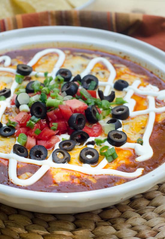 Beef Enchilada Dip in a white serving dish.