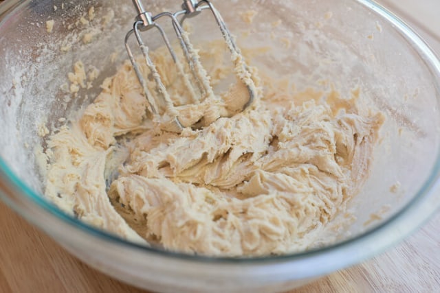 The sticky dough in the mixing bowl after it has been combined.