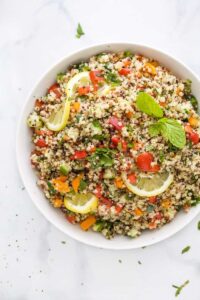Tabbouleh salad in a white bowl.