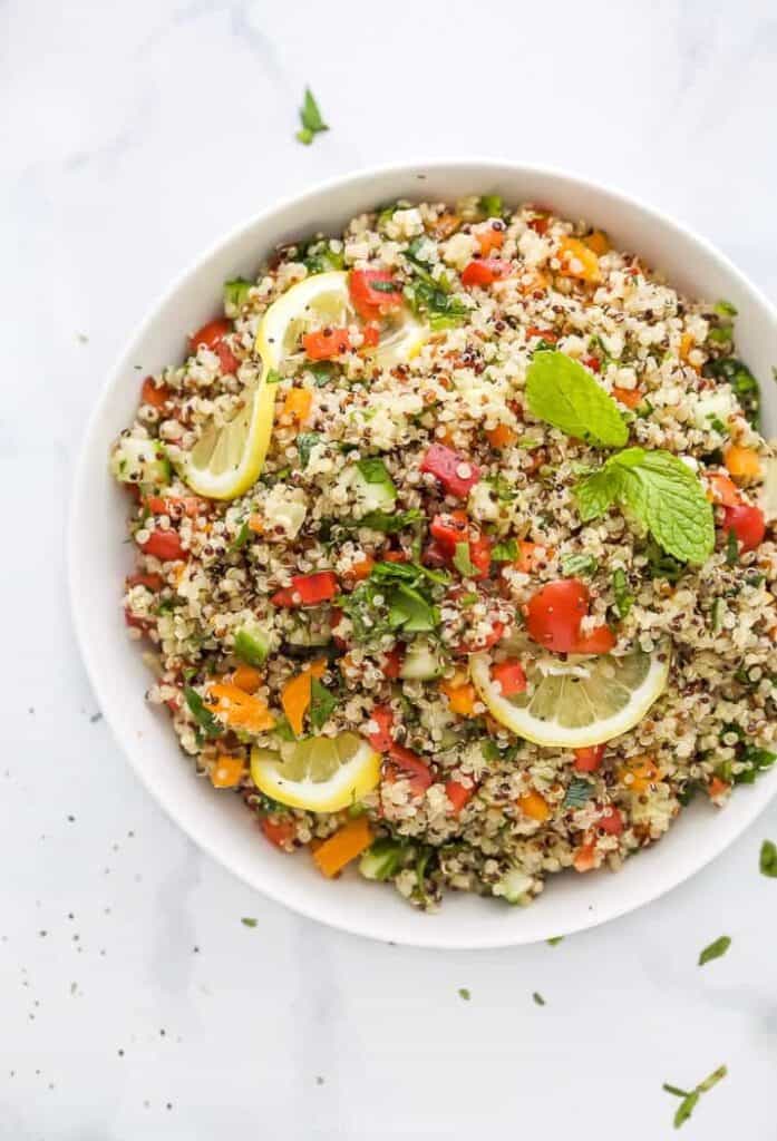 Tabbouleh salad in a white bowl.