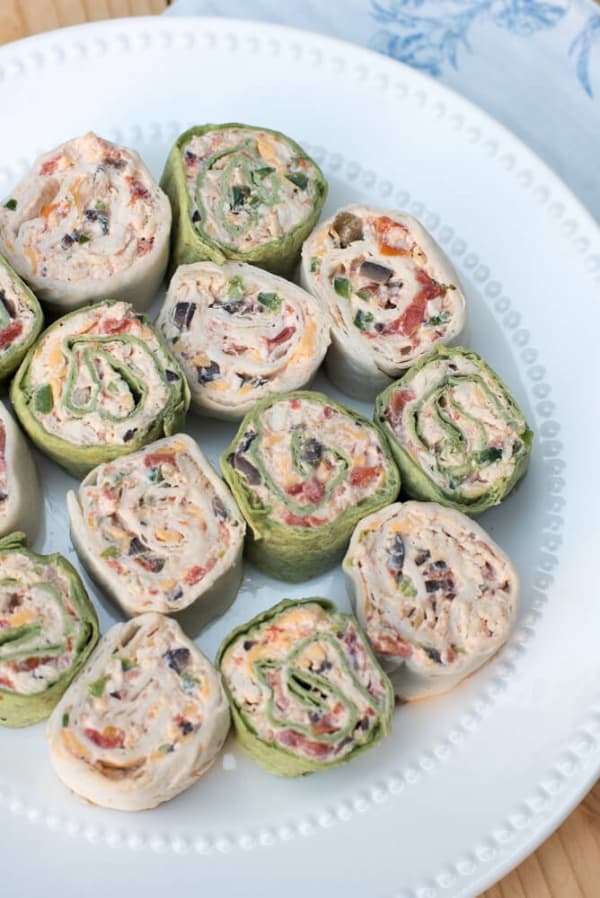 The classic party appetizer with a Southwest twist. These pretty Southwest Chicken Tortilla Pinwheels are made ahead and are waiting for you in the refrigerator to slice and serve at party time. A great addition to your appetizer menu at any time of year.