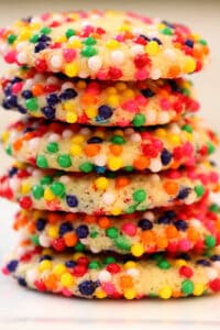 A stack of cookies with sprinkles.