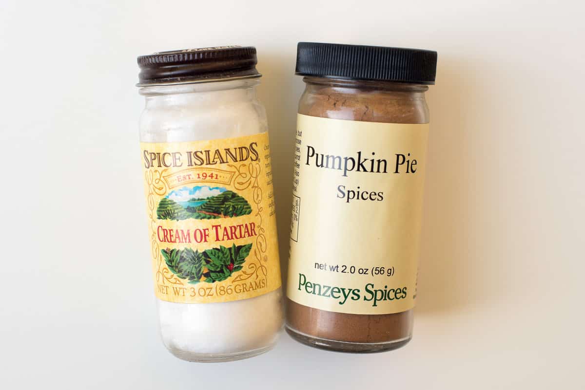A jar of Spice Island's cream of tartar and a jar of Penzey's pumpkin pie spice