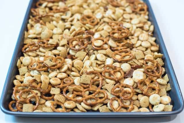 Garlic Dill Snack Mix on a baking sheet.