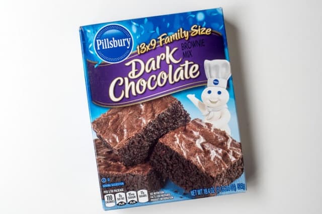 A package of Pillsbury Dark Chocolate Brownie Mix.