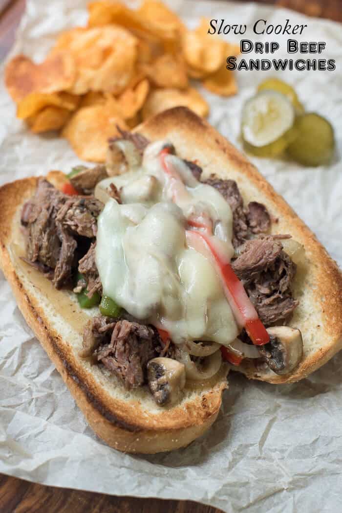 A drip beef sandwich on a hoagie roll with melted cheese with text overlay.