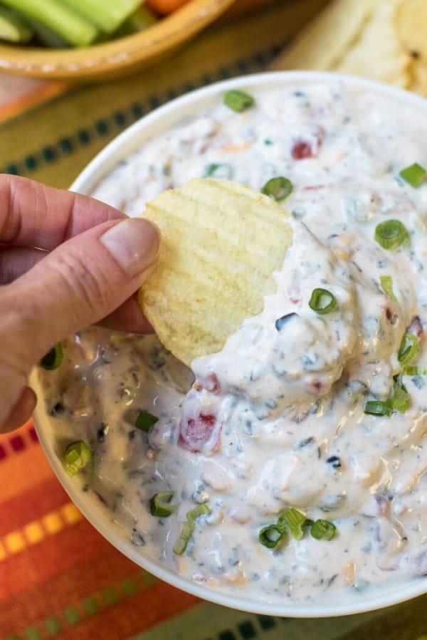 A chip is dipped into Southwestern Ranch Dip.