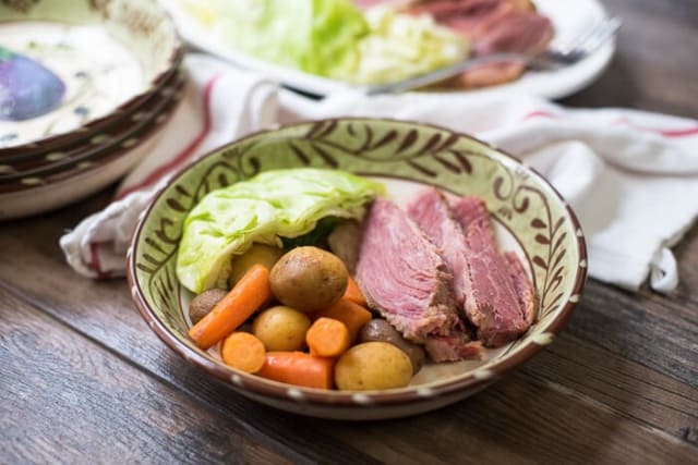 Slow Cooker Corned Beef and Cabbage in a serving bowl.