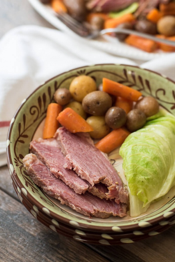 Slow Cooker Corned Beef and Cabbage in a serving bowl.