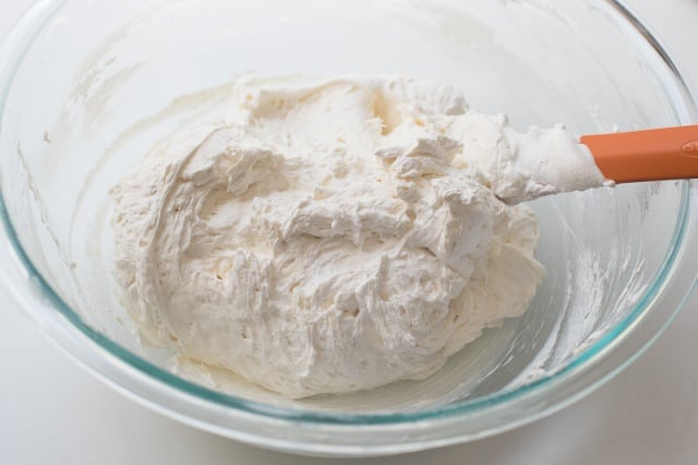 A fluffy cream cheese mixture in a bowl.