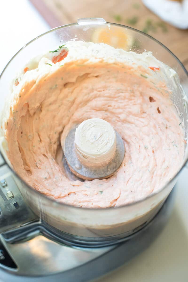 The ingredients after they have been blended together in the bowl of a food processor.