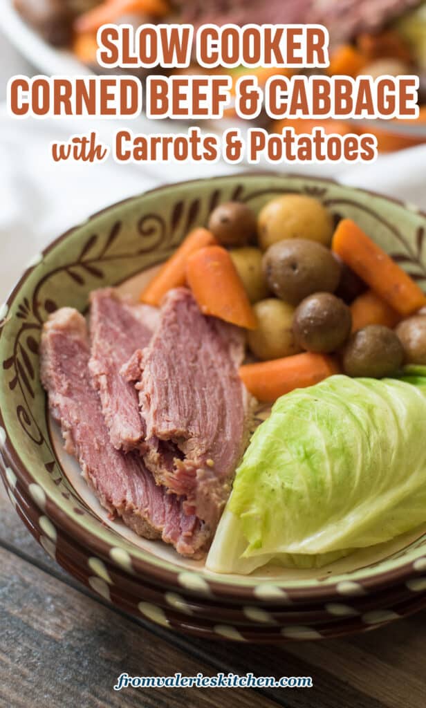 Sliced corned beef with cabbage, potatoes, and carrots in a bowl with text.