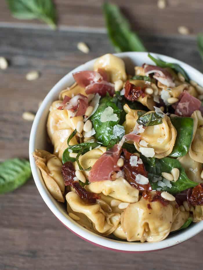 A close up of Italian Tortellini Salad in a small bowl.