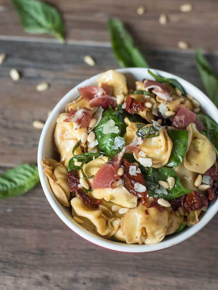 Italian Tortellini Salad in a small white bowl.