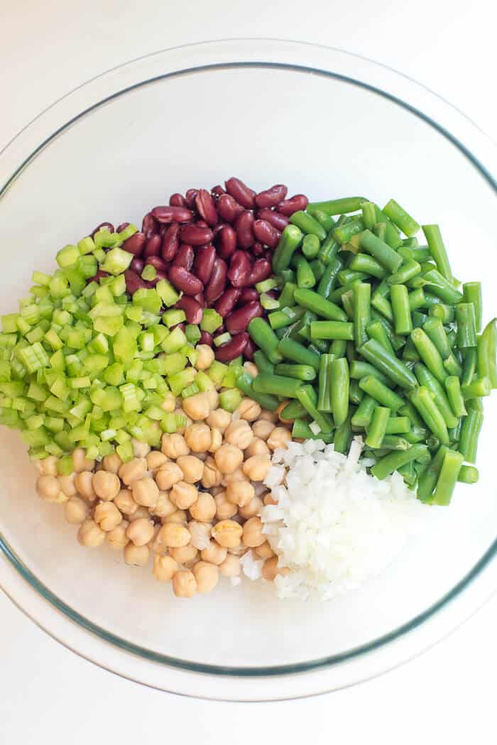 The ingredients in divided piles in a glass mixing bowl.