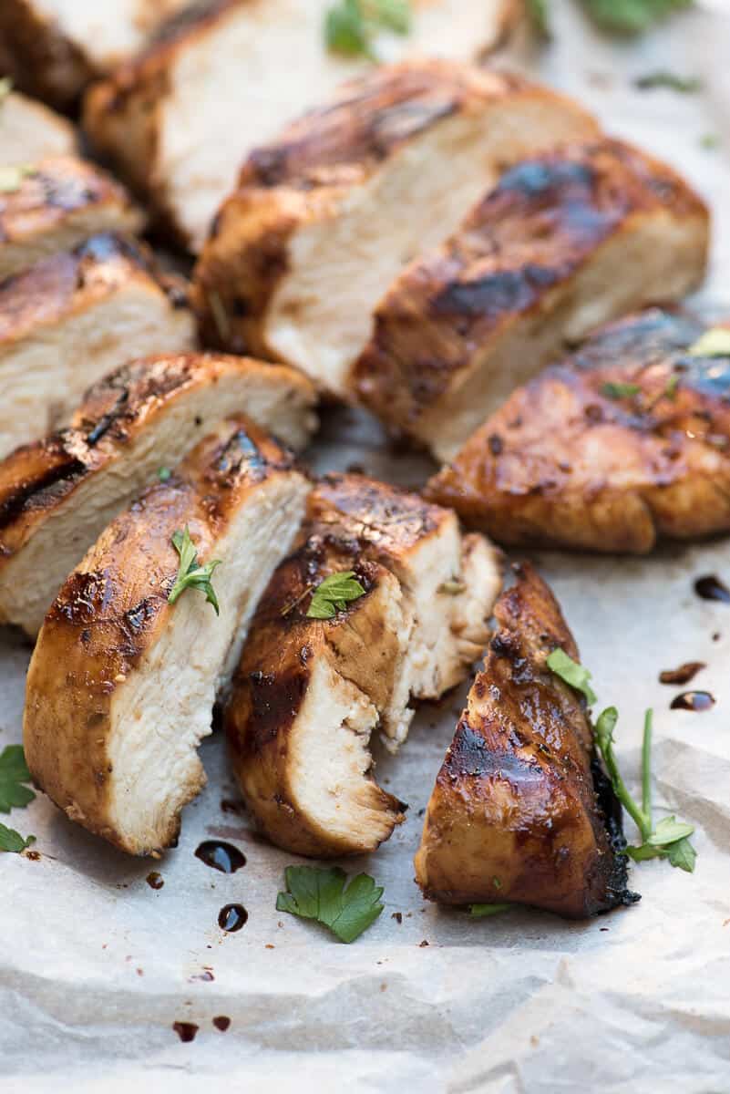 A close up of sliced grilled chicken.
