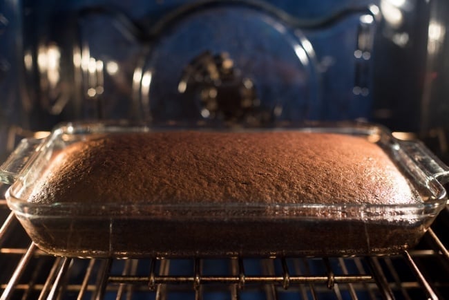 One Bowl Chocolate Cake baking in the oven.