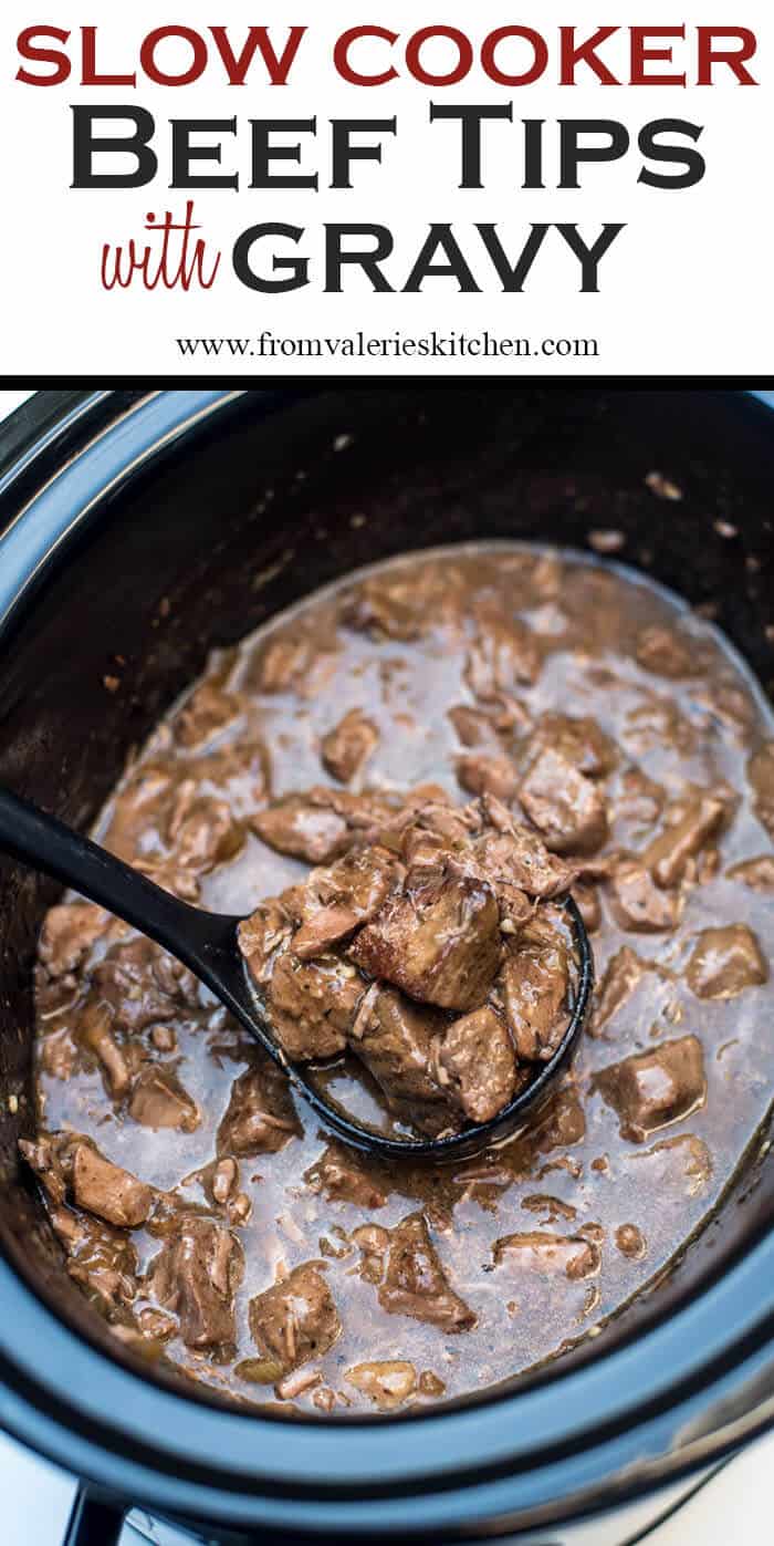 Slow Cooker Beef Tips with Gravy being spooned out of a slow cooker with a ladle.