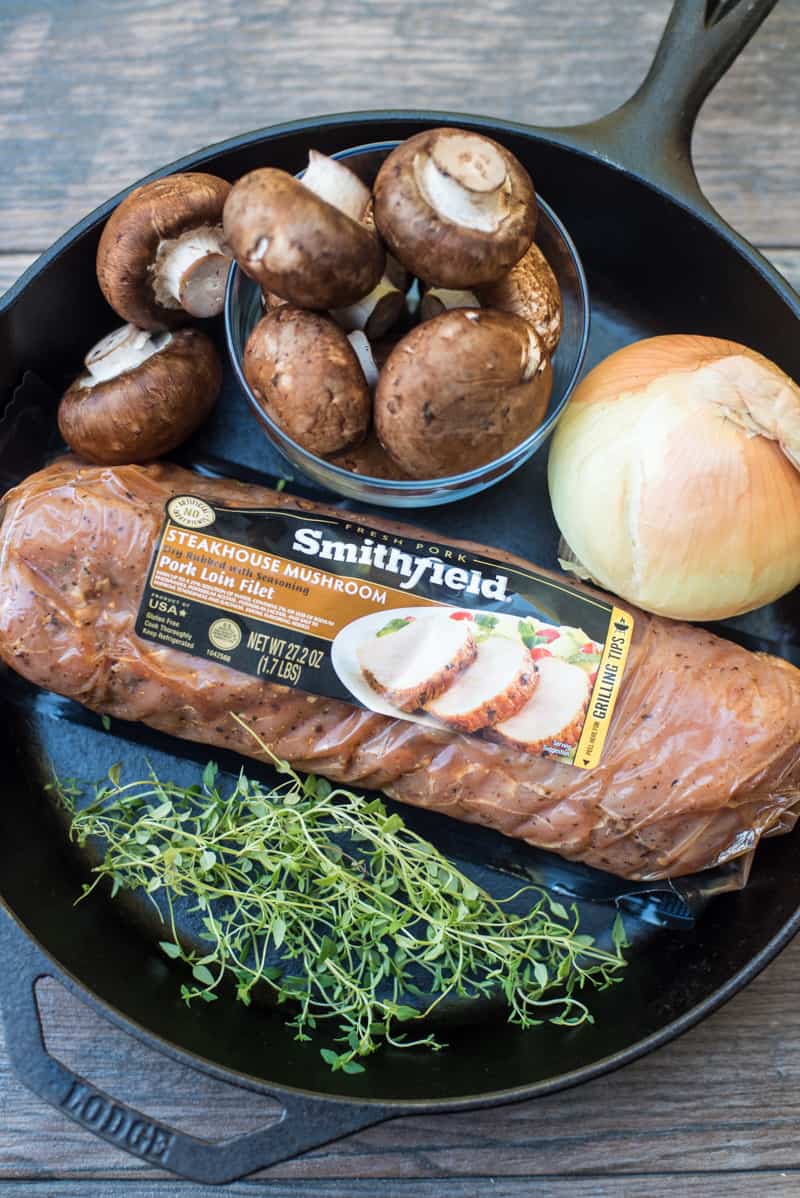 The ingredients lying in a cast iron skillet.