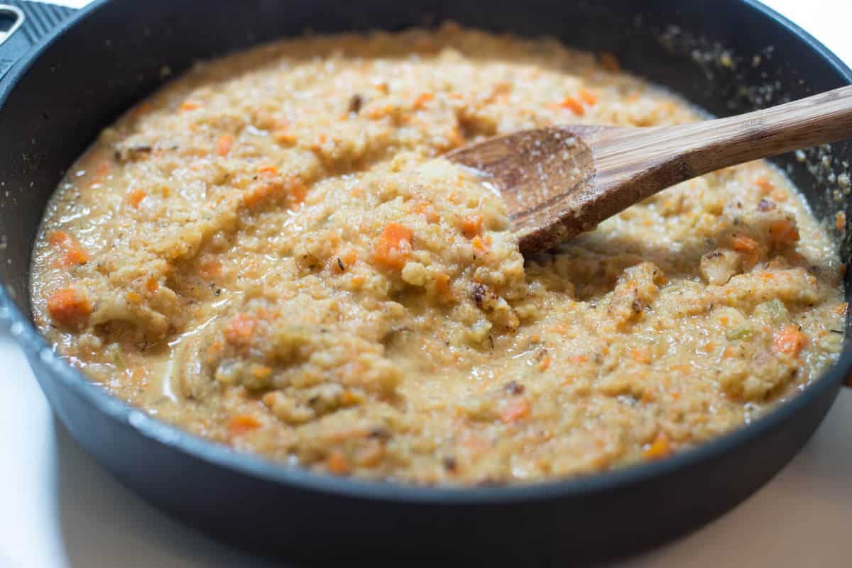 Pureed cauliflower and other vegetables in a skillet.