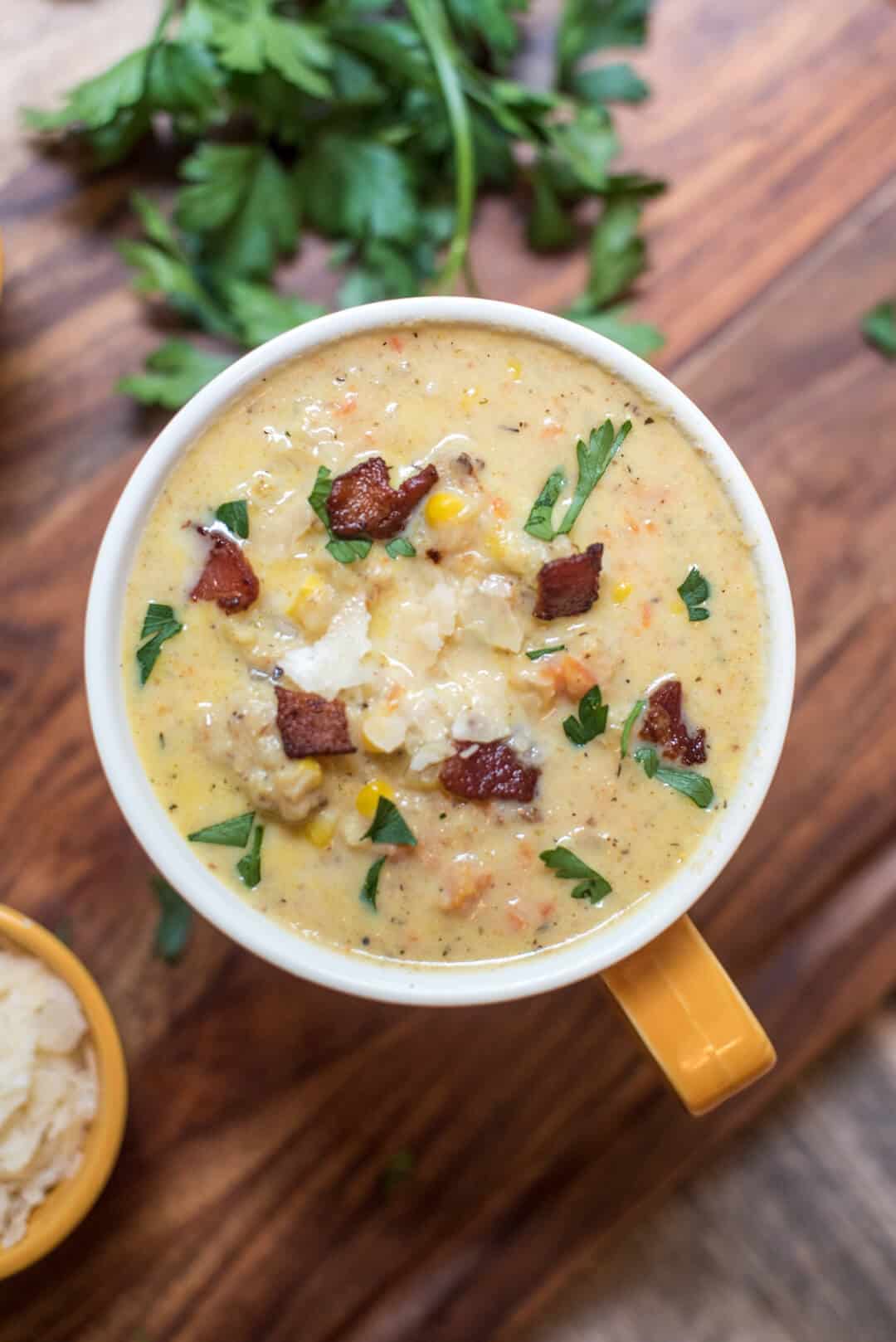 Roasted cauliflower, garlic, bacon and Parmesan add incredible flavor that pairs perfectly with sweet corn in this Roasted Cauliflower Corn Chowder.