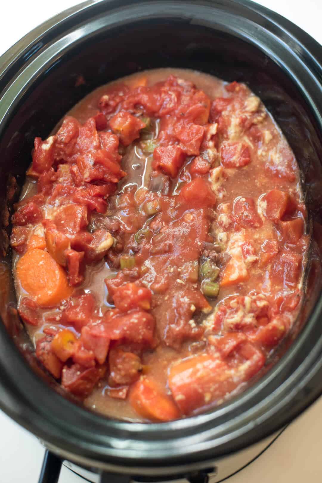 Slow Cooker Italian Pot Roast ingredients in a slow cooker.