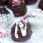 A close up of an oreo cookie ball with festive decorations.